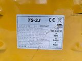 a label on the back of a yellow dump truck