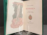 an open book with a picture of a waterfall in it