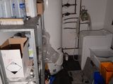 an image of a bathroom with a water heater in it