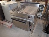a stove that is sitting in the middle of a room