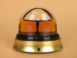 a glass dome with a light on top of it
