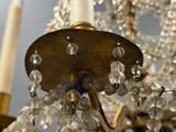 a chandelier that has a lot of crystals hanging from it