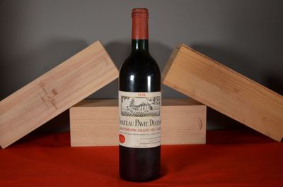 a bottle of wine that is sitting on a table