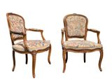 pair of louis xv style carved wood armchairs