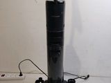 an image of a black vacuum cleaner on a table
