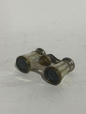 a pair of binoculars that are sitting on a table