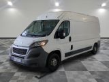 a picture of a white van parked in a room