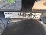 a close up of a motorcycle tire with a sticker on it