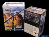 two boxes of one piece action figures sitting next to each other