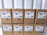 several boxes are stacked on top of each other on a table