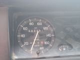 a close up of a speedometer in a car