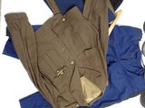 a pair of pants and a pair of shoes on the floor