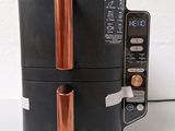 an image of a black and copper coffee maker on a counter