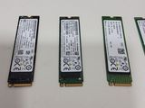 four different types of ram cards sitting on top of a white table
