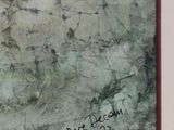 a picture of a piece of art with writing on it