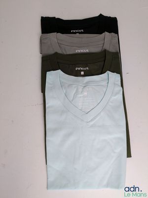 three men ' s v - neck t - shirts are stacked on top of each other
