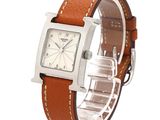 an image of a close up of a wrist watch on a white background