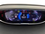 the dashboard of a car with a digital display in the center