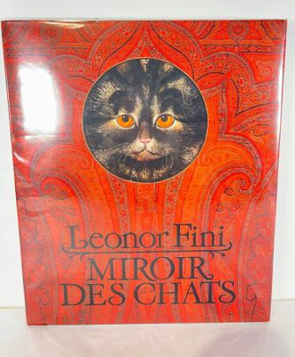 the cover of a book with a cat ' s face on it