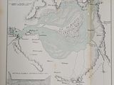 an old map of a river in a book on a table