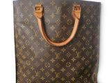 une image d'un sac à main Louis Vuitton sur fond blanc