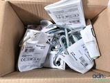 a cardboard box filled with a bunch of different types of screws