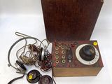 a wooden box with a bunch of wires in it
