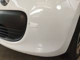 a close up of a car ' s front bumper