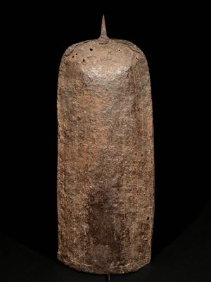 une image représentant un objet en pierre sur fond noir