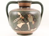a vase with a painting of a man and a woman on it