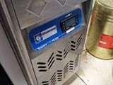 an image of a commercial ice cream machine in a kitchen