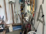 a room with a lot of tools on the wall