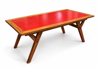 an image of a wooden table with a red top on a white background