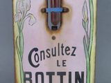 a sign with a thermometer on it that says constitez le bottin