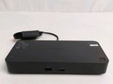 an image of a black device with a charger on top of it