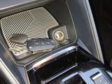 a picture of a car dashboard with a car key in it