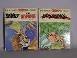two comics are sitting on a table next to each other