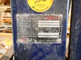 a picture of a machine that is sitting in a warehouse