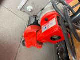 a close up of a red fire hydrant on the floor