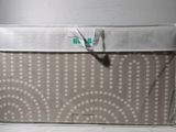 a baby crib with a crib bed attached to it