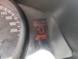 a close up of a car dashboard with a speedometer