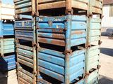 many blue crates stacked on top of each other