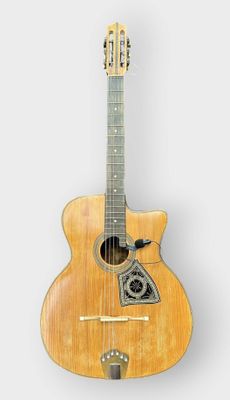 an image of a guitar that is sitting up against a white background