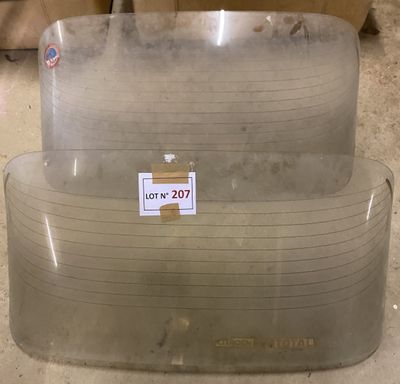 two clear plastic containers sitting on top of each other