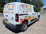 a van that is parked on the side of the road