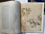 an open book with a drawing on it on a table