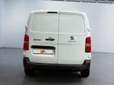 a white van that is parked in a room