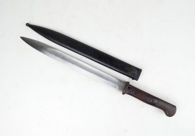 a knife on the table next to a knife on the table