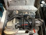 a tool box with tools in it sitting on the floor