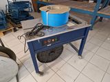 an image of a table with a blue bucket on top of it